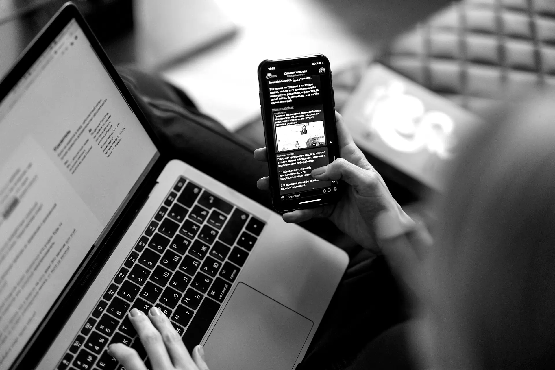person holding black iphone 4