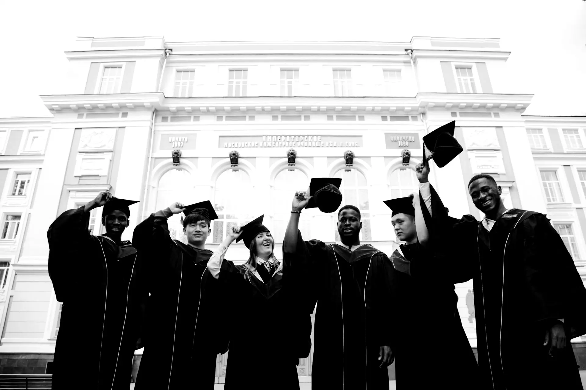 group of people in black academic dress