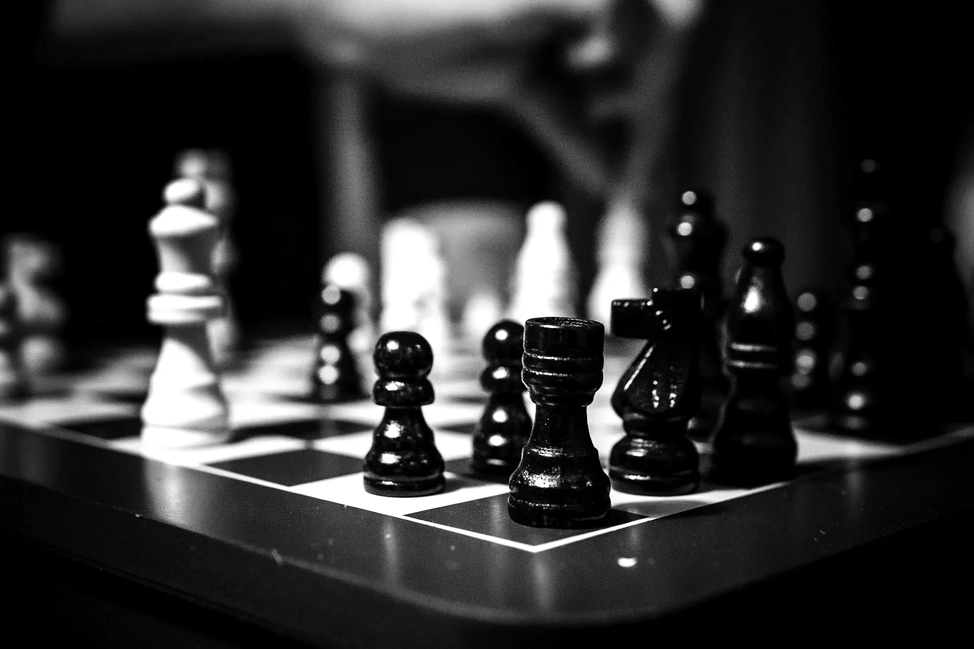 white, black, and brown chess board game